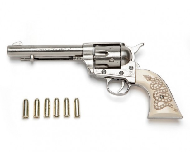 Kolser Colt 45 collectionist revolver replica with engraved rattlesnake in pistol grip