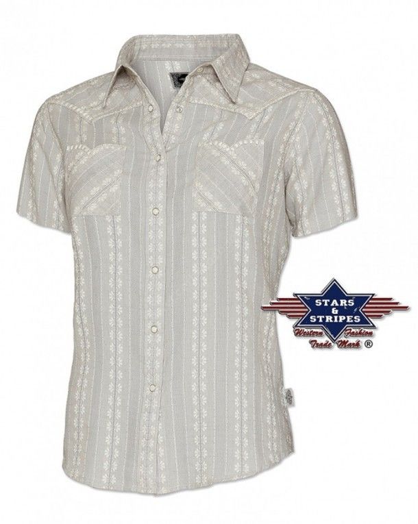 Puedes comprar en nuestra tienda online esta camisa vaquera Stars & Stripes para chica de manga corta de tejido ligero y con brocados blancos.