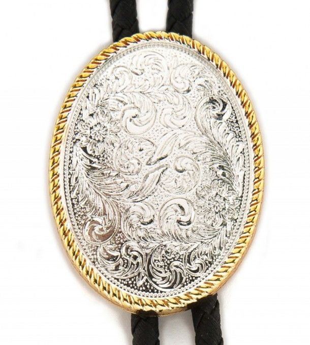 Shop at our online cowboy web store this bolo tie for shirt made in shiny silver and golden metal. Perfect to combine with a silver belt buckle.