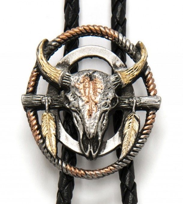 Buy now at our cowboy online shop to get this oval distressed bolo tie for shirts with a big steer head ornated with two detailed pewter feathers.