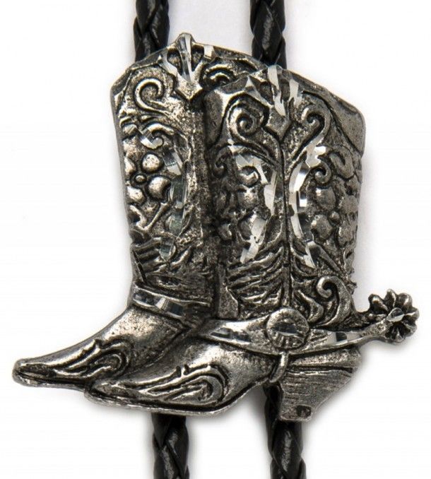 Buy this unisex western bolo tie for shirts with the shape of a pair of cowboy boots in relief at our specialized boots and country accessories store.