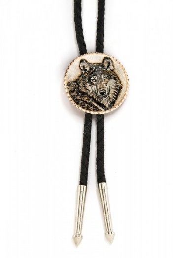 Make yourself a present buying this elaborate copper made bolo tie with the drawn picture of a wolf head or visit our online western shop.