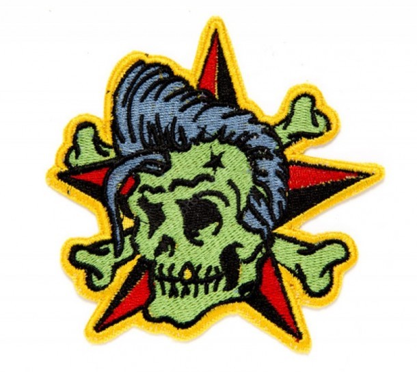 Buy at our specialized online shop this rockabilly skull embroidered patch with a rocker bang, crossed bones and a Sailor Jerry red / black star.