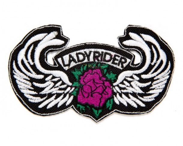 You can buy in a few steps this Lady Rider biker style clothing patch with a violet rose and two extended white wings, made for motorcycle girls.