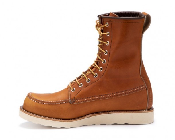 Russet brown high leg Red Wing boots with thick white outsole
