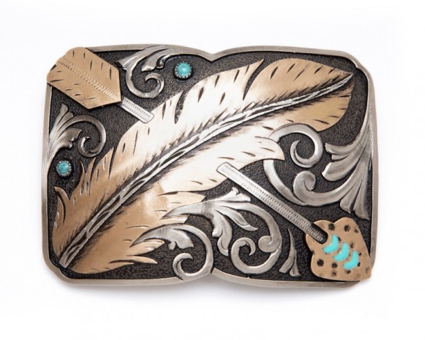 Cowboy style handcrafted belt buckle with feather and crossed arrow