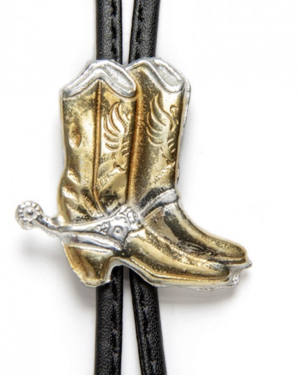Golden cowboy boots and silver spurs western bolo tie