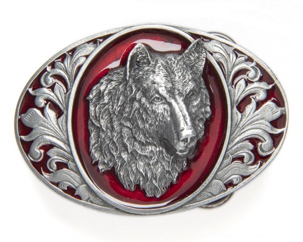 American wolf oval metallic buckle over red enamel background