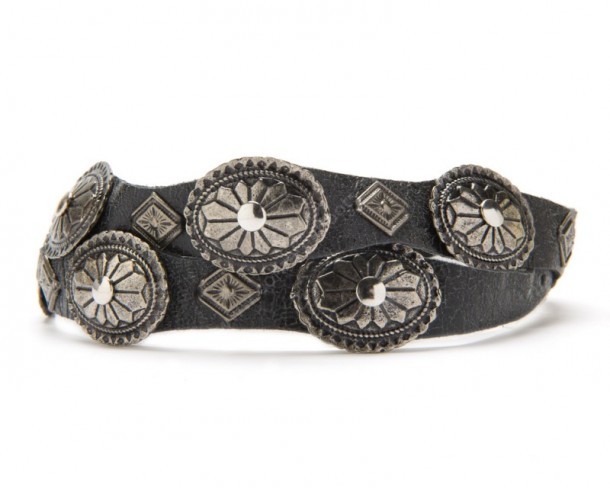 Distressed leather hat band for black hat with tribal style metal decorations 