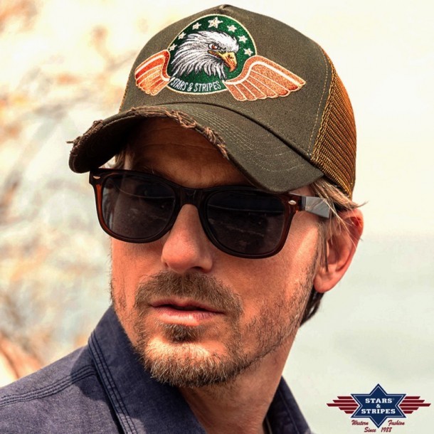 Green biker style cap with distressed look visor and embroidered eagle